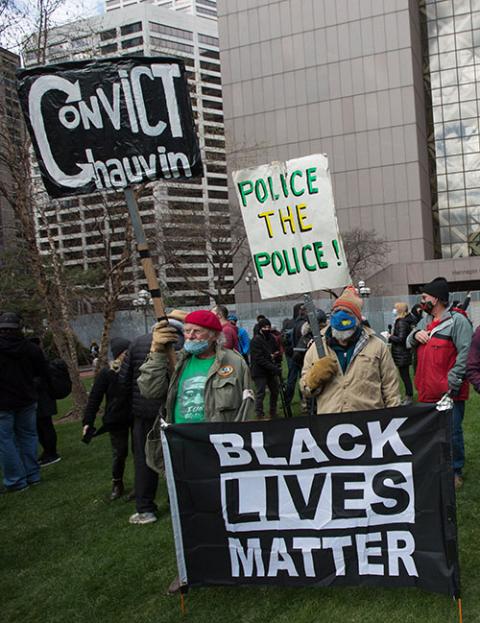 People gather near the Hennepin County Government Center in Minneapolis April 20 to await the verdict in the trial of former Minneapolis police officer Derek Chauvin. (CNS/The Catholic Spirit/Dave Hrbacek)