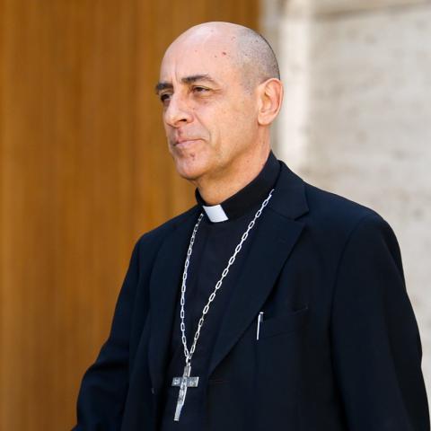 Cardinal Víctor Manuel Fernández, prefect of the Dicastery for the Doctrine of the Faith, leaves the Vatican's Paul VI Audience Hall after a working session of the assembly of the Synod of Bishops with Pope Francis at the Vatican Oct. 6, 2023. (CNS photo/Lola Gomez)