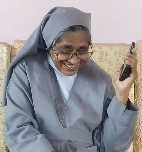 Salesian Sr. Tresa Karottukunnel speaks to a former resident of Home of Hope at Imphal, India. (Thomas Scaria)