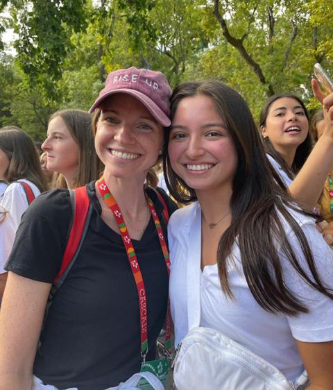 Laura Matthews leading a retreat, posing with one of her high school students (Courtesy of Laura Matthews)