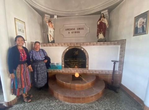 On Aug. 22, 2023, novice Angelica Alvarado, left, and Mother Marta Yach Cosme stand by the tomb of Sr. Tonia Maria Orland, foundress of the congregation Missionary Sisters of the Eucharist. Orland, of the Sisters of the Presentation of the Blessed Virgin Mary, promoted vocations among Indigenous people in Guatemala. (GSR photo/Rhina Guidos)