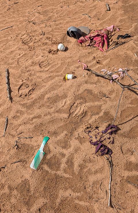 Personal items discarded by migrants are found by the search and rescue group not far from the road in the Santa Teresa Desert in southern New Mexico. (Pauline Hovey)