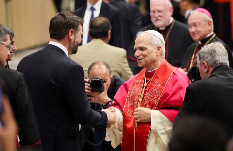 Pope Leo XIV, formerly Cardinal Robert Francis Prevost, greets U.S. Vice President JD Vance and his wife, Usha Vance, far left, after the pontiff celebrated his inauguration Mass at the Vatican May 18, 2025. Pope Leo is the first American pope in history. (OSV News photo/Claudia Greco, pool via Reuters)