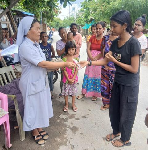 Sr. Melanie Mai Chit Yin during her field visits to console women and children who were the most affected victims of a 7.7 magnitude earthquake that hit Myanmar on March 28. (Courtesy of Sr. Mary Jose)