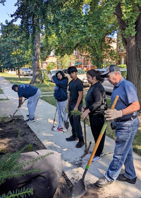 Members of Voces have worked on phytoremediation projects, such as planting rain gardens, at churches and homes in Cicero. They are pictured Sept. 7, 2024. (Courtesy of Delia Barajas)