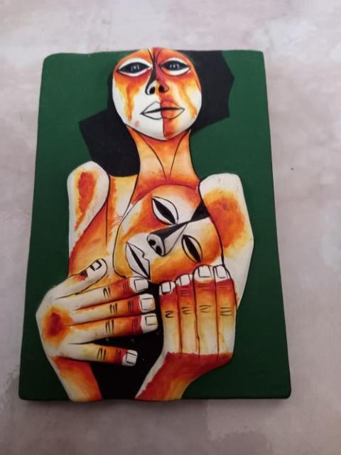 Painting depicts one person cradling another in her hands.