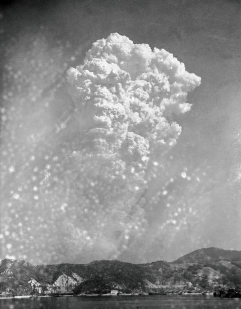 Smoke rises around 20,000 feet above Hiroshima, Japan, after the first atomic bomb was dropped, Aug. 6, 1945. The Nobel Peace Prize has been awarded to Nihon Hidankyo, a Japanese organization of survivors of the U.S. atomic bombings of Hiroshima and Nagasaki, for its activism against nuclear weapons. (AP Photo, File)