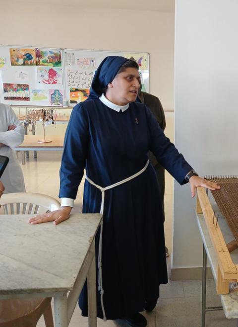 Sr. Rose Hanna, director of Hôpital Psychiatrique de la Croix, is pictured during her daily tasks at the hospital. (Courtesy of Hôpital Psychiatrique de la Croix)