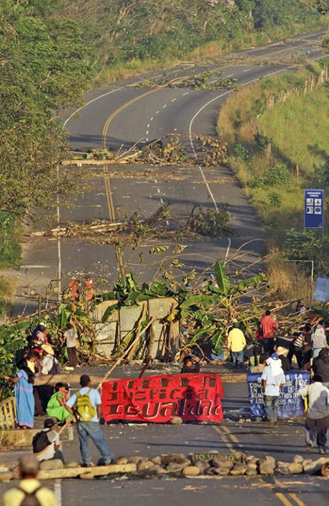 Ngäbe-Buglé people block the Pan-American Highway in El Vigui, Panama, on Feb. 4, 2012, to protest mining exploitation on their lands. (AP Photo/Arnulfo Franco) Ngäbe-Buglé people block the Pan-American Highway in El Vigui, Panama, on Feb. 4, 2012, to protest mining exploitation on their lands. (AP Photo/Arnulfo Franco)