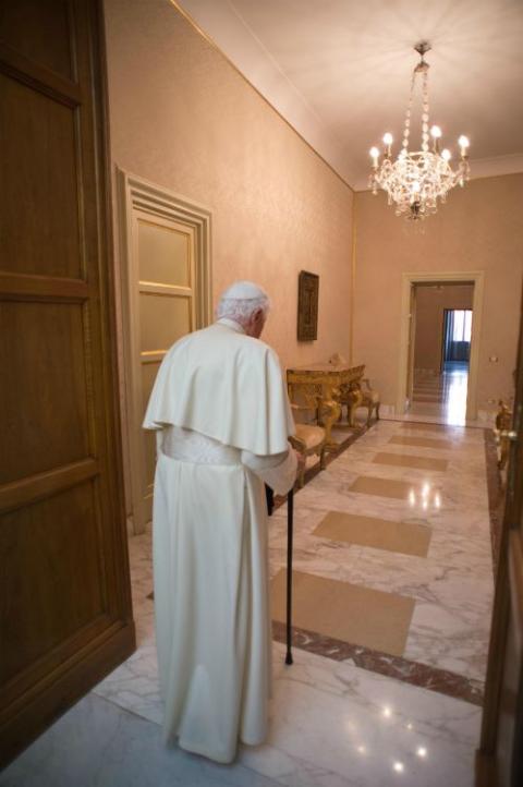 Pope Benedict XVI retires to the apartment at his summer residence in Castel Gandolfo, Italy, Feb. 28, 2013, after appearing at the balcony of the residence. It was his final public appearance on the balcony before his papacy drew to a close. (CNS/Catholic Press Photo /L'Osservatore Romano)