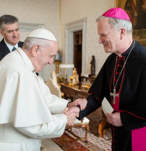 Pope Francis greets Bishop James Johnston Jr. of Kansas City-Saint Joseph, Missouri, as he meets with U.S. bishops from Iowa, Kansas, Missouri and Nebraska during their "ad limina" visits to the Vatican Jan. 16. (CNS/Vatican Media)