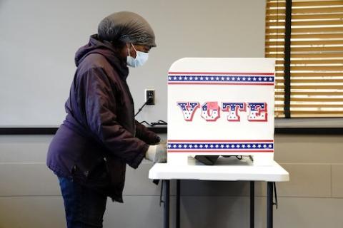 A voter in Milwaukee Oct. 20 ahead of the November election (CNS/Reuters/Bing Guan)