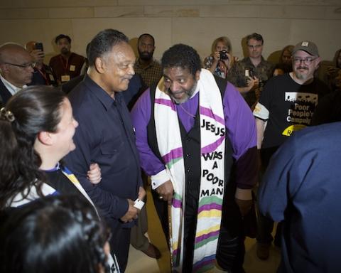 The Rev. Liz Theoharis, the Rev. Jesse Jackson and the Rev. William Barber