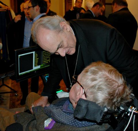 Bishop Marcelo Sánchez Sorondo, chancellor of the Pontifical Academy of Sciences, talks with physicist Stephen Hawking Nov. 30, 2016, during a break at a Vatican-sponsored conference on the power and limitations of artificial intelligence. (Pontifical Aca Bishop Marcelo Sánchez Sorondo, chancellor of the Pontifical Academy of Sciences, talks with physicist Stephen Hawking Nov. 30, 2016, during a break at a Vatican-sponsored conference on the power and limitations of artificial intelligence. (Pontifical Aca