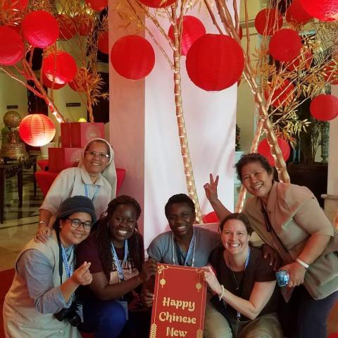 Sisters from the Sisters For Christian Community pose with some Chinese New Year decorations during the community's 2019 international assembly in Manila, the Philippines, in January 2019. (Courtesy of Sr. Margaret Gonsalves) 