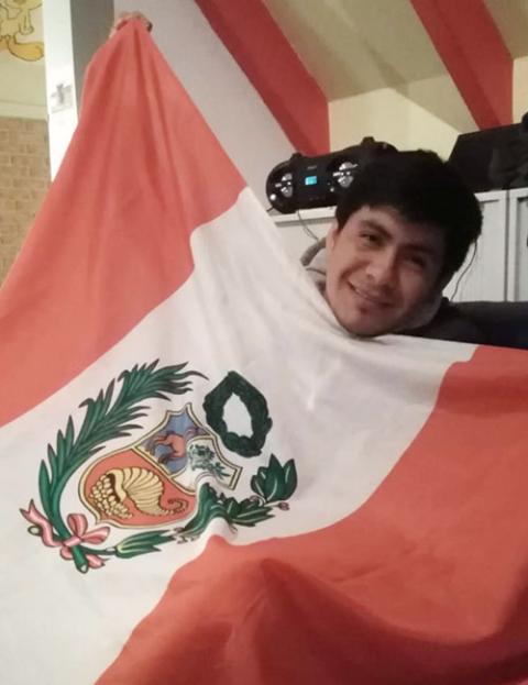 Felipe Vega Fernández displays a Peruvian flag. (Courtesy of Felipe Vega Fernández) Felipe Vega Fernández displays a Peruvian flag. (Courtesy of Felipe Vega Fernández)