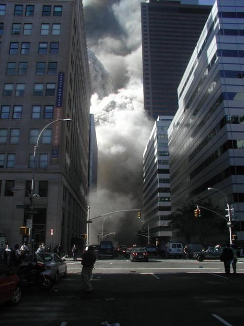 A cloud of dust and smoke is seen through the buildings along West Broadway in New York City, after the collapse of World Trade Center 2 on Sept. 11, 2001. (Wikimedia Commons/Hans Joachim Dudeck) A cloud of dust and smoke is seen through the buildings along West Broadway in New York City, after the collapse of World Trade Center 2 on Sept. 11, 2001. (Wikimedia Commons/Hans Joachim Dudeck)
