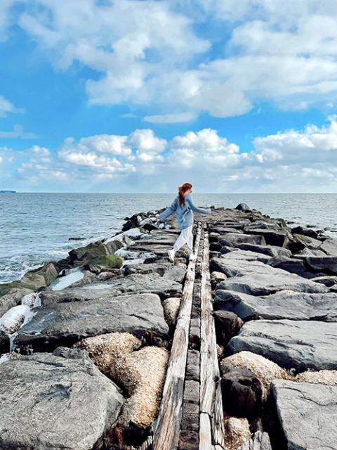 My New York community drove down to Asbury Park in New Jersey before our social justice and simplicity retreat. We played on the rocks and listened to the waves. (Gabby Kasper)