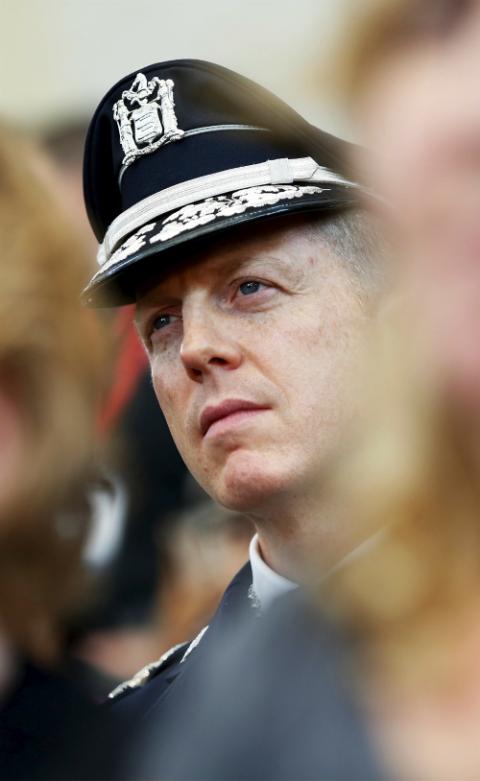 Camden County Police Chief John Scott Thomson listens as U.S. President Barack Obama delivers remarks after meeting with local youth and law enforcement officials in Camden, New Jersey, May 18, 2015. (Newscom/Reuters/Jonathan Ernst)