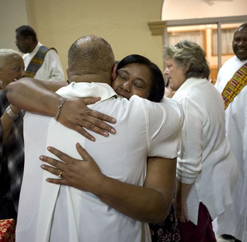 Worshippers exchange the sign of peace at St. Rita's Catholic Church in San Diego in 2019. (CNS/David Maung) Worshippers exchange the sign of peace at St. Rita's Catholic Church in San Diego in 2019. (CNS/David Maung)