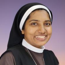 Lismy Parayil smiling