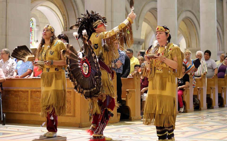 Members of the Huron-Wendat Nation perform a purification ritual at the Basilica of Sainte-Anne-de-Beaupré in Quebec June 26, 2016. (CNS/Presence/Philippe Vaillancourt)