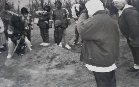 An outing for the residents of Dehon House in 1995. Dominican Sr. Lois McGovern is watching from the far right, as the residents plant a tree.  (Provided photo)