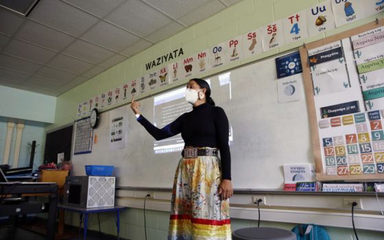 Multi-immersion teacher Randilynn Boucher-Giago leads a lesson on boarding school history Sept. 29, 2021, in Pine Ridge, S.D. (AP/Emily Leshner)