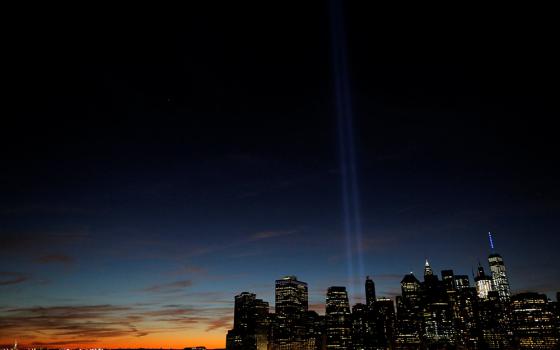 The "Tribute in Light" is seen on the eve of the 15th anniversary of the 9/11 attacks on the World Trade Center in New York Sept. 10, 2015. The Sept. 11, 2001, terrorist attacks claimed the lives of nearly 3,000 people. (CNS/Reuters/Andrew Kelly)