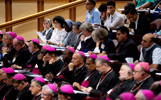 Women religious are seen at a session of the Synod of Bishops on young people, the faith and vocational discernment at the Vatican Oct. 4. (CNS/Vatican Media)