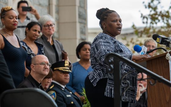 Rebecca Kitana, a parishioner at St. Matthew Church in Northwood, Maryland, talks during an Oct. 10 announcement at Sacred Heart of Jesus-Sagrado Corazon de Jesus in Baltimore about an ID card program for immigrants. (CNS/Catholic Review/Kevin J. Parks)