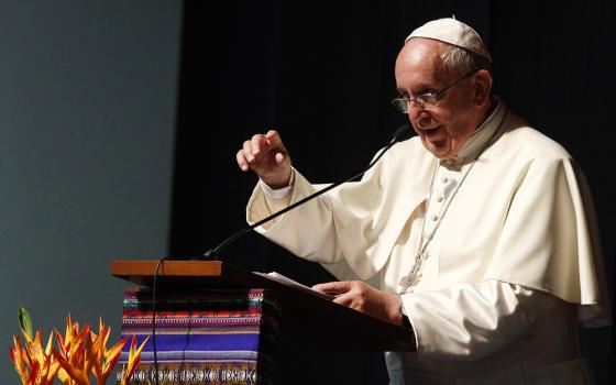 Pope Francis speaks at the second World Meeting of Popular Movements in Santa Cruz, Bolivia, July 9, 2015. "The popular movements are not only social poets but also collective Samaritans," Francis said in a video message Oct. 16 for the 2021 meeting (CNS)