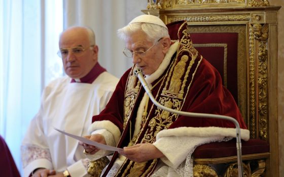 Pope Benedict XVI reads his resignation in Latin during a meeting of cardinals at the Vatican on Feb. 11, 2013. (CNS/L'Osservatore Romano)