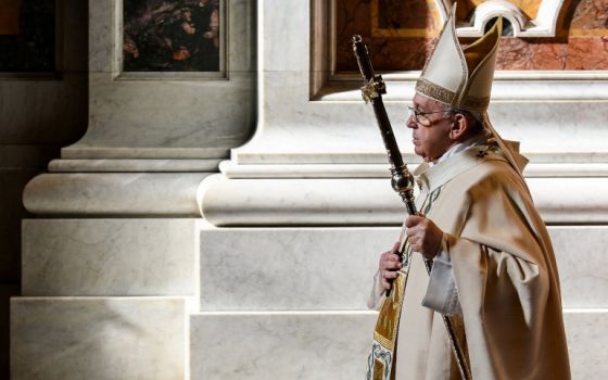 Pope Francis leaves after celebrating a Mass on the feast of Christ the King in St. Peter's Basilica at the Vatican Nov. 22. (CNS/Reuters pool/Vincenzo Pinto)