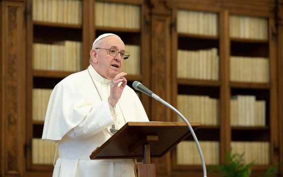 Pope Francis leads the midday recitation of the Angelus Jan. 17, 2021, from the library of the Apostolic Palace at the Vatican. (CNS/Vatican Media)