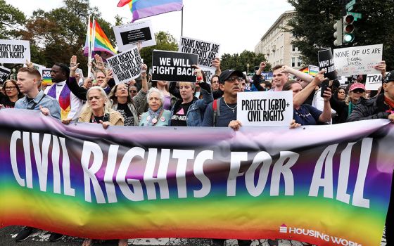 Activists demonstrate in support of LGBTQ rights outside the U.S. Supreme Court in Washington Oct. 8, 2019. (CNS/Reuters/Jonathan Ernst)