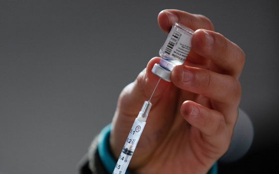 A health care worker administers COVID-19 vaccines at a mass vaccination site in Ridgefield, Washington, Jan. 27. (CNS/Reuters/Alisha Jucevic)