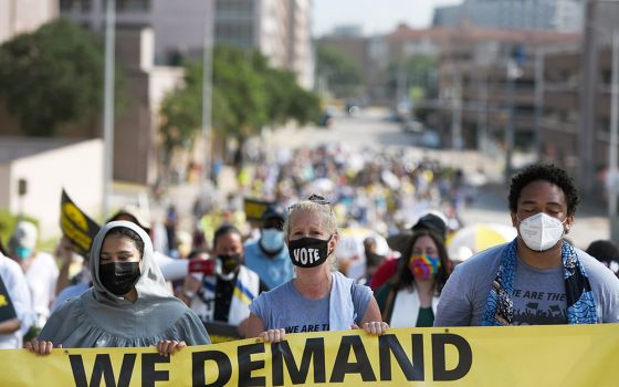 Protesters take part in a July 31, 2021, march in Austin, Texas, for voting rights and against a measure in the Legislature to enact voting restrictions. (CNS/Reuters/Callaghan O'Hare)