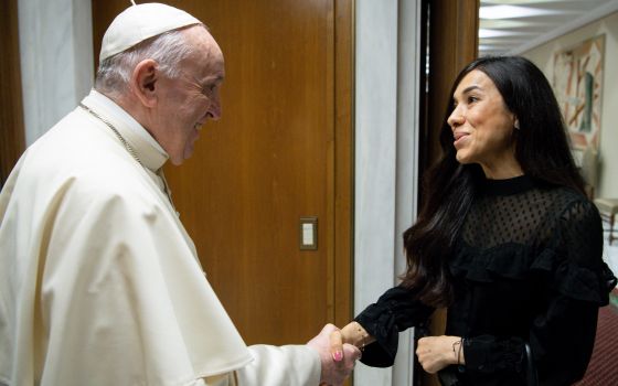 Pope Francis meets with Nobel Peace Prize laureate Nadia Murad during a private meeting at the Vatican Aug. 26, 2021. Murad was kidnapped by Islamic State militants in Iraq in 2014 during a genocidal campaign against the Yazidi people. (CNS photo/Vatican 