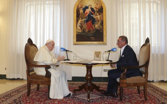 Pope Francis speaks during an interview with Carlos Herrera of COPE, the radio network owned by the Spanish bishops' conference, at the Vatican in late August. (CNS/Courtesy of COPE)