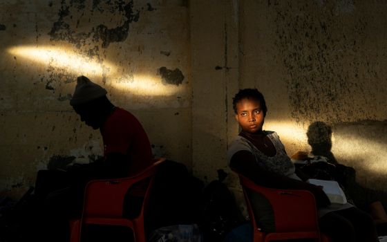 Migrants seeking asylum in the U.S., who returned to Mexican side of the border to avoid deportation, take shelter in Ciudad Acuna, Mexico, Sept. 24, 2021. (CNS photo/Go Nakamura, Reuters)