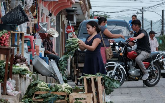 People are seen in El Paraiso, Honduras, July 24, 2021. (CNS photo/Yoseph Amaya, Reuters)