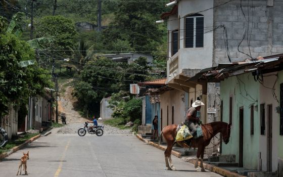 People are seen in El Paraiso, Honduras, July 24, 2021. (CNS photo/Yoseph Amaya, Reuters)