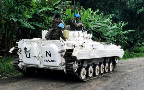 : U.N. peacekeepers patrol areas affected by recent attacks from rebels near Rangira, Democratic Republic of Congo, in March. (CNS/Reuters/Djaffar Sabiti) 