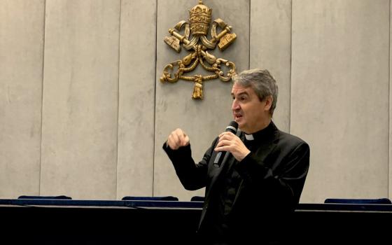 Oblate Father Andrew Small, speaks to reporters in the Vatican press office Oct. 28, 2022