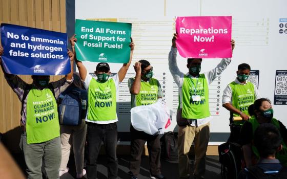 Climate activists from Asian Peoples' Movement on Debt and Development raise concerns in Sharm el-Sheikh, Egypt, Nov. 9, 2022. (Doreen Ajiambo)