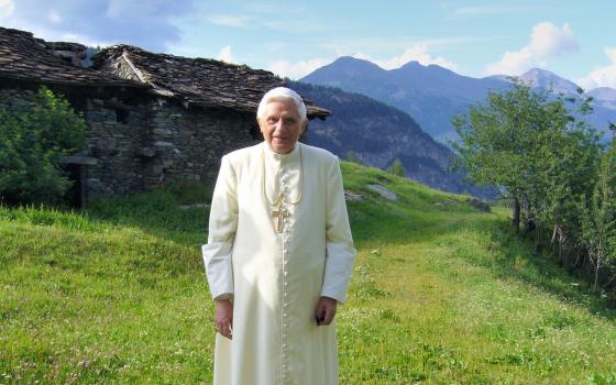 Pope Benedict XVI poses in Alpeggio Pileo near his summer residence in Les Combes, in the Valle d'Aosta in northern Italy July 14, 2005. Pope Benedict died Dec. 31, 2022, at the age of 95 in his residence at the Vatican. 