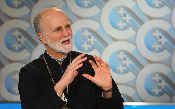 Archbishop Borys Gudziak of the Ukrainian Catholic Archdiocese of Philadelphia gestures during an interview with Catholic News Service at the headquarters of the U.S. Conference of Catholic Bishops in Washington March 14, 2022. (CNS photo/Bob Roller)