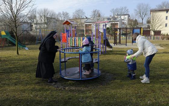 Sister Zuzanna plays with the children of Olga, a Ukrainian refugee, at a kindergarten run by the Missionary Sisters of the Holy Family in Lublin, Poland, on March 17. Thousands of refugees from Ukraine have been assisted by and are living with communitie