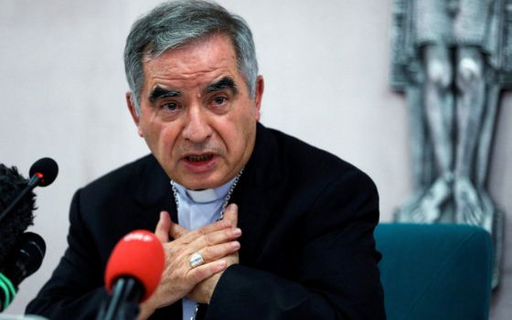 Cardinal Angelo Becciu speaks with journalists during a news conference in Rome in this Sept. 25, 2020, file photo. (CNS photo/Guglielmo Mangiapane, Reuters)